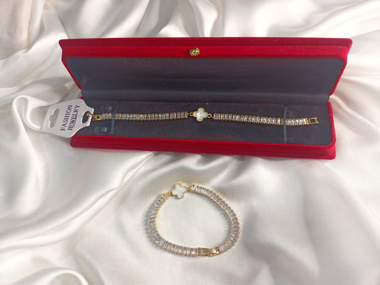 Elegant Gold-Plated Bracelet with Crystal Accents & Clover Charm